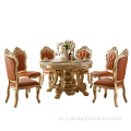 mesa de comedor redonda italiana tallada en madera barroca dorada